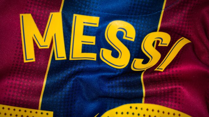 Barcelona shirt with Messi's name.